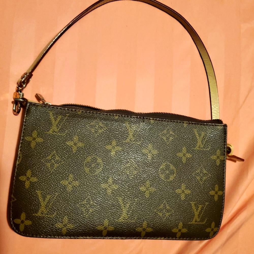 Gently used Louis Vuitton Monogram Clutch